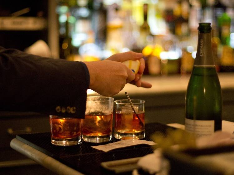 Experience high-end mixology at a top cocktail bar