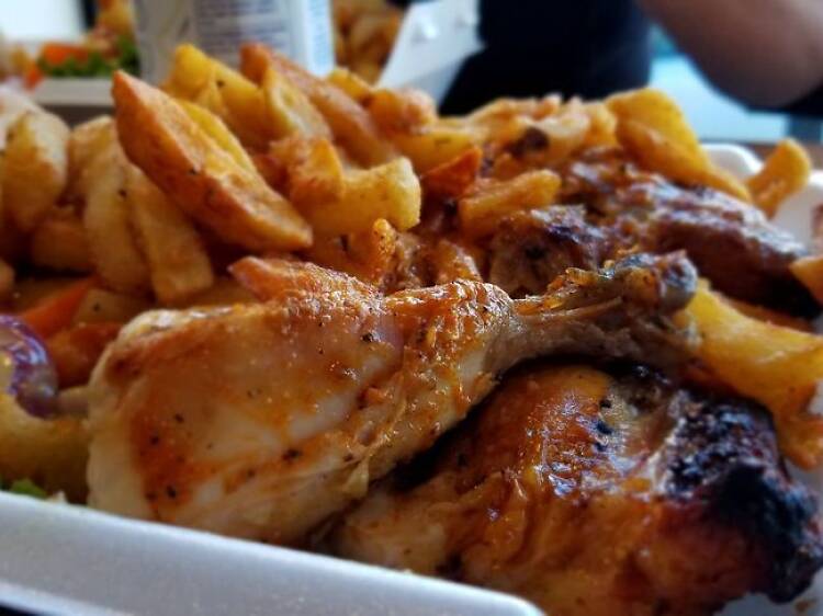 Half-Chicken with Fries at Romados